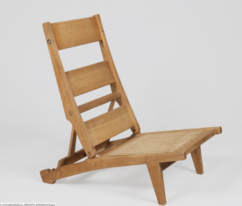 Chauffeuse en chêne.